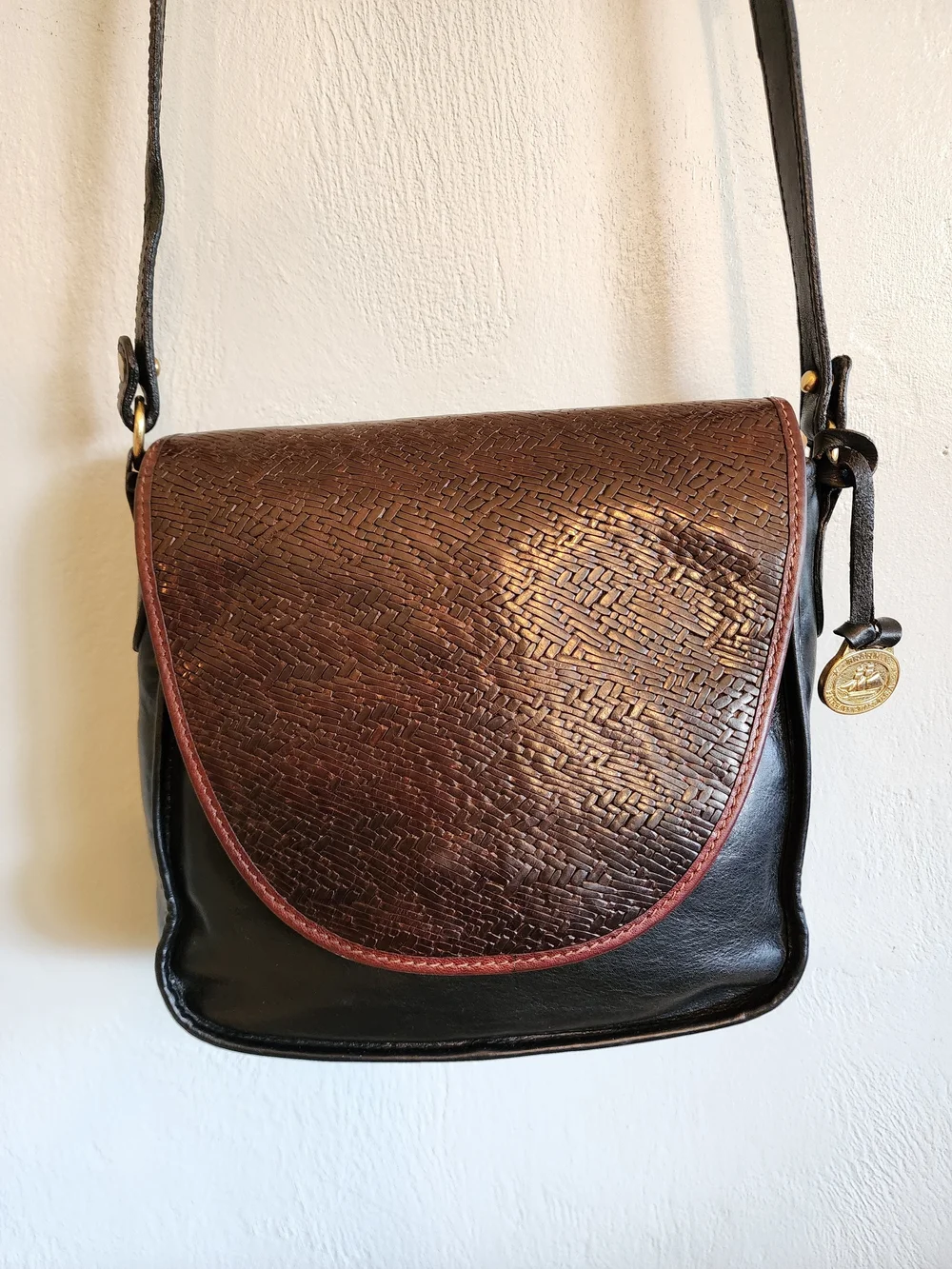 Vintage Brahmin Black Leather Crossbody with Brown Woven Flap